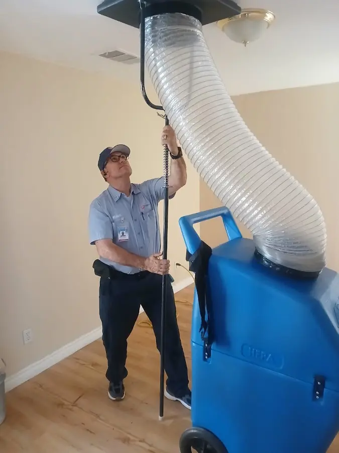 HVAC Installation technician using HEPA equipment in Spring